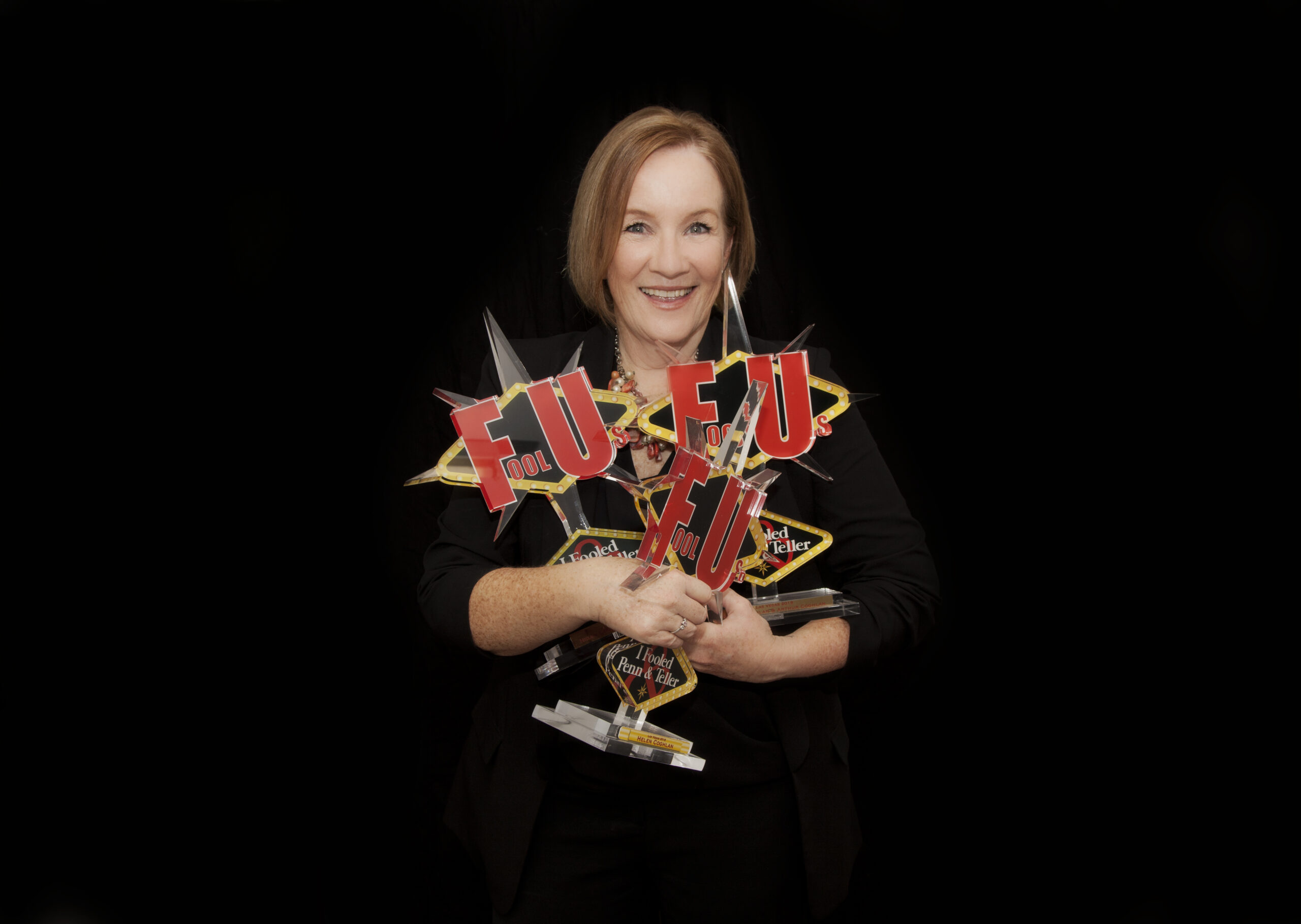 Helen Coghlan with Penn & Teller: Fool Us trophies